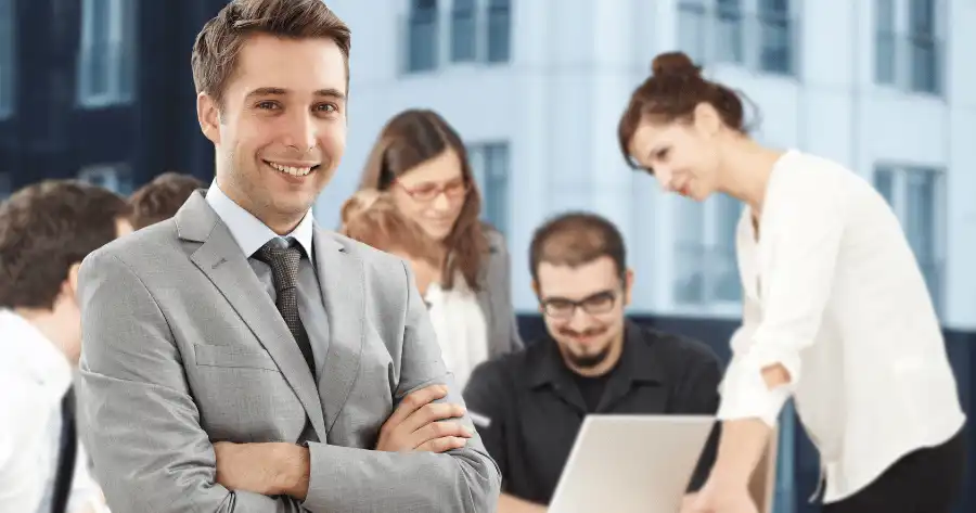 A young business man in charge of the Digital MArketing Transformation Team, in his back working of the project of a corporate client.