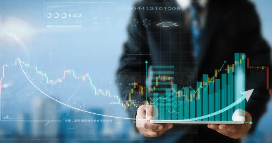 Strategy  Digital Marketing Transformation per impresa raffigurata by a person holding a tablet with graphs and numbers that shows strategy of growth of its small enterprise